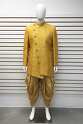 Yellow sherwani with gold dhoti pant