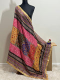 Malai silk dupatta with colorful patchwork and gold border, draped on mannequin