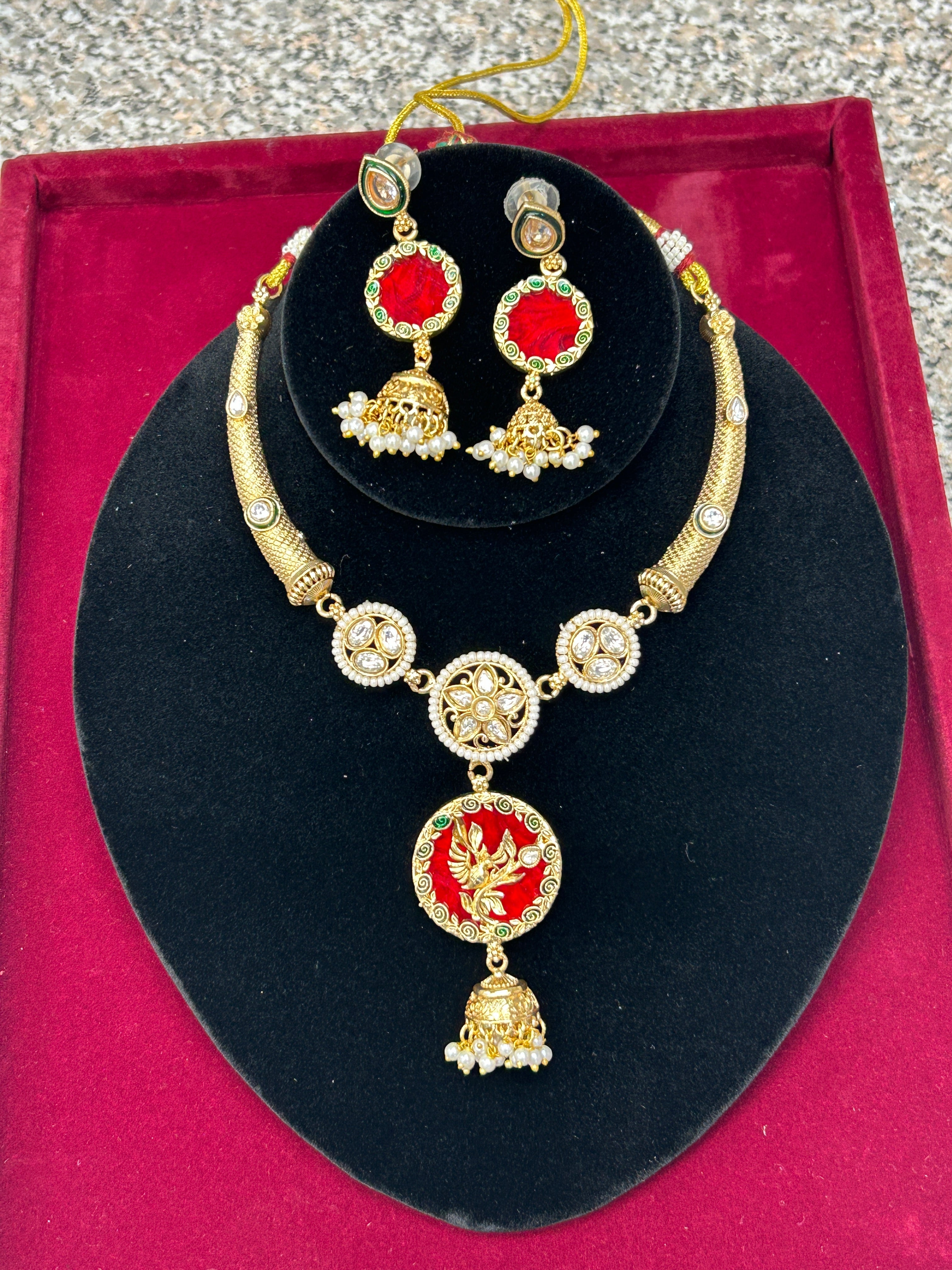 Gold polished necklace set by Kurti Connection USA