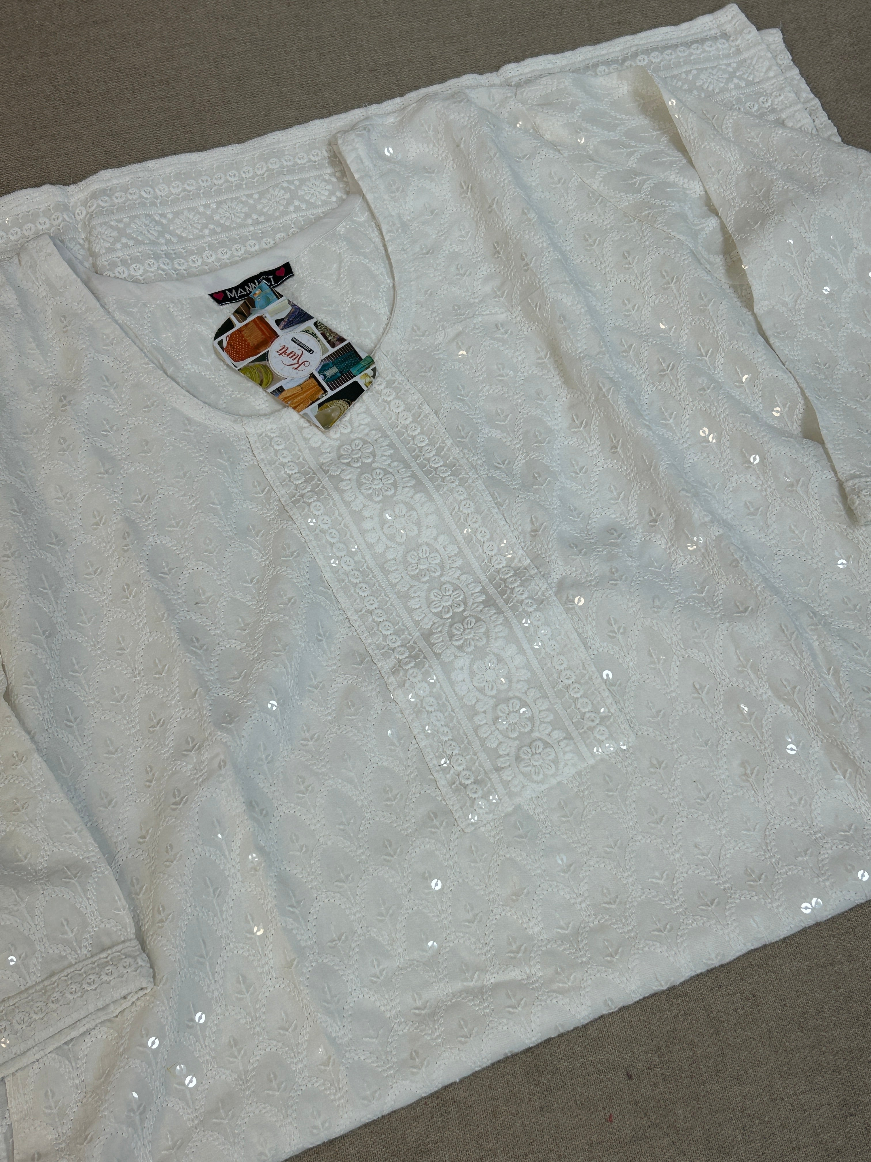 White chikankari kurti with light sequin work by Kurti Connection USA
