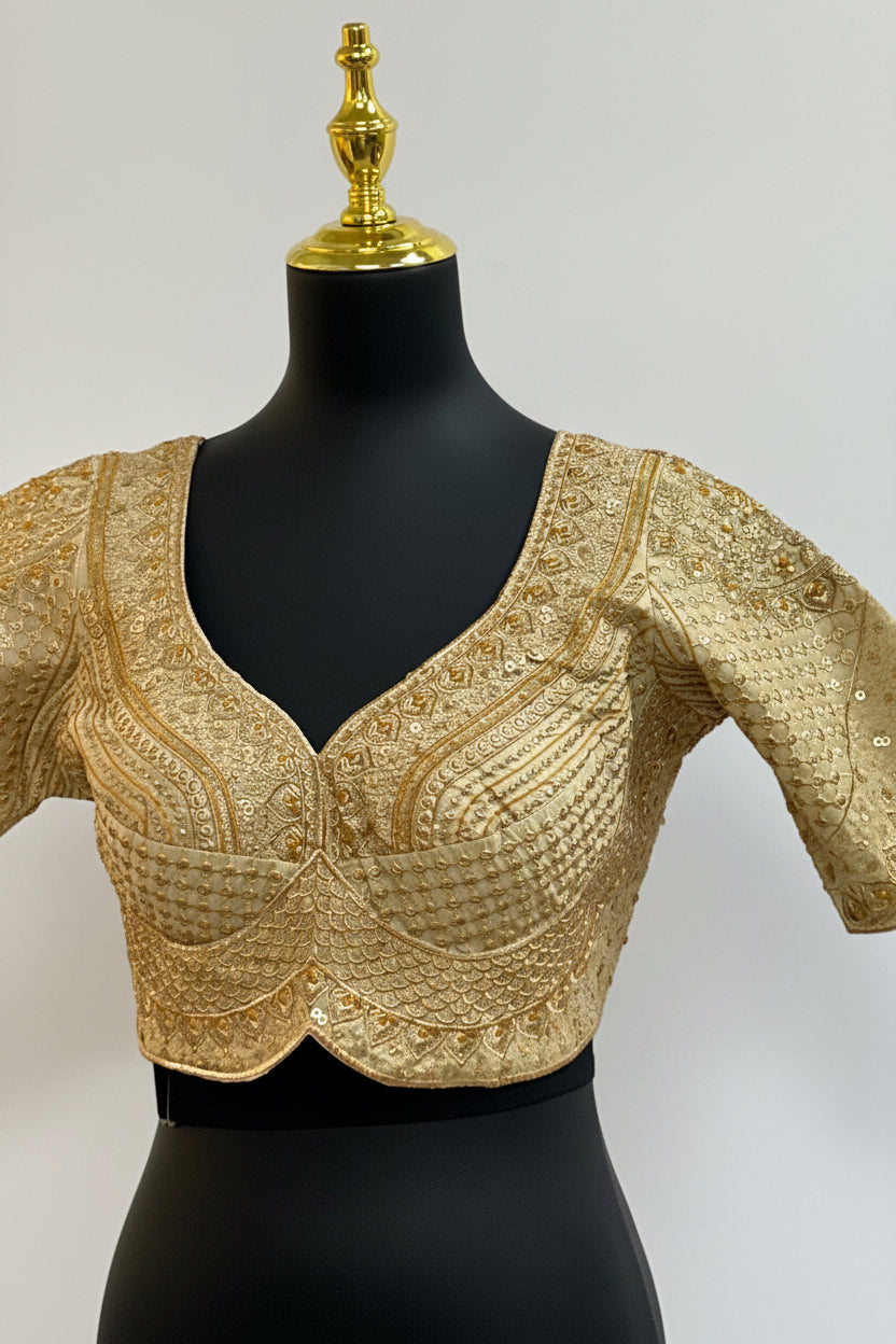 Gold blouse with heavy embroidery work
