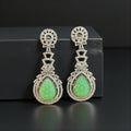Green carved stone earrings by Kurti Connection USA