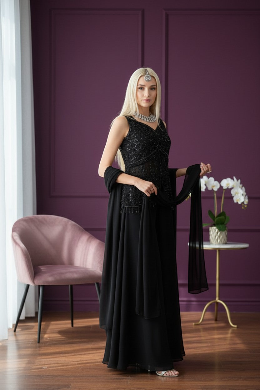 House Of Indian Wedding Attire black sleeveless V-neck palazzo suit with intricate beadwork and sequins, paired with a sheer dupatta.