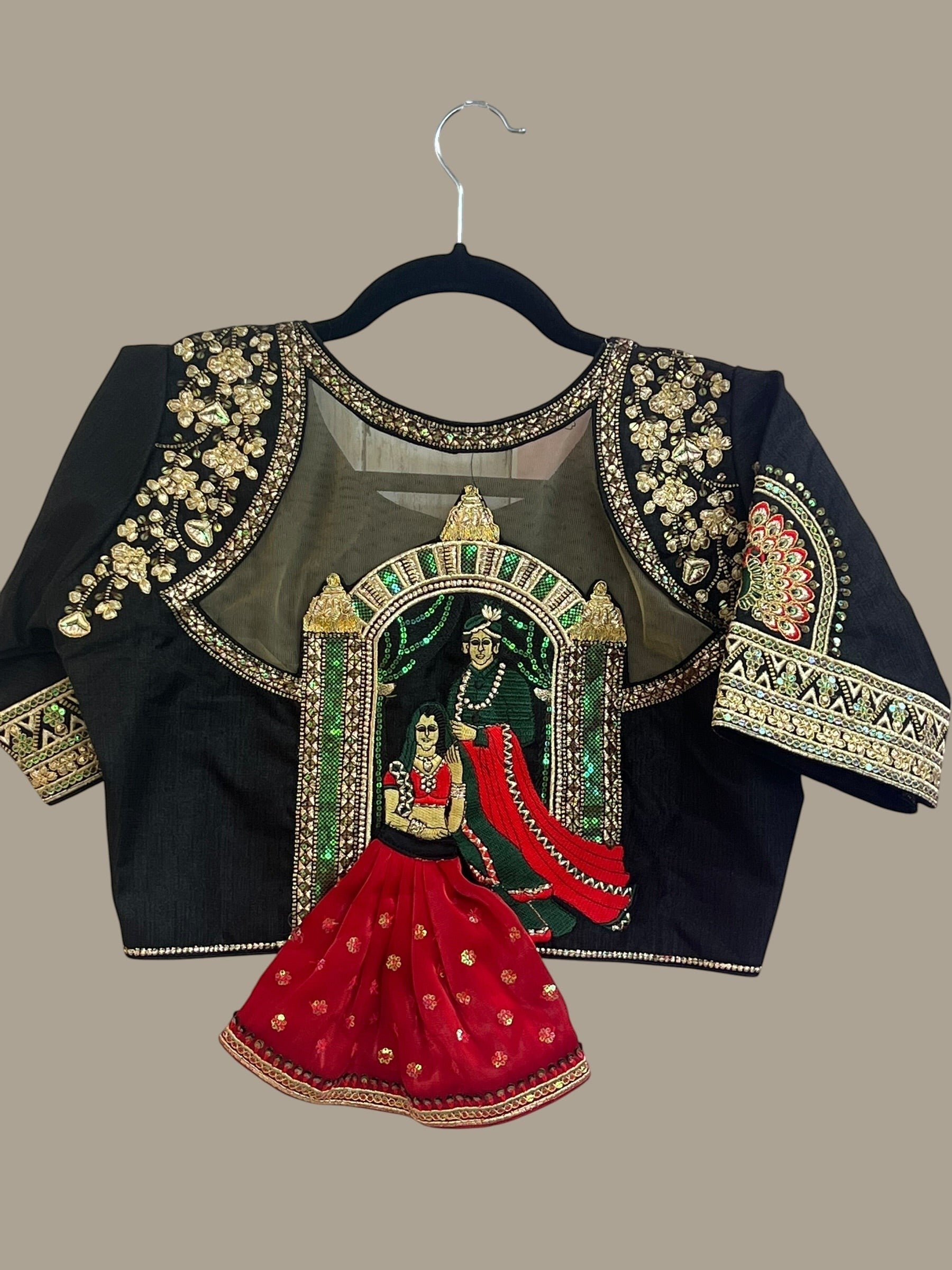 House Of Indian Wedding Attire black blouse with intricate embroidery, sheer neckline, and sequin details. Elbow-length sleeves.
