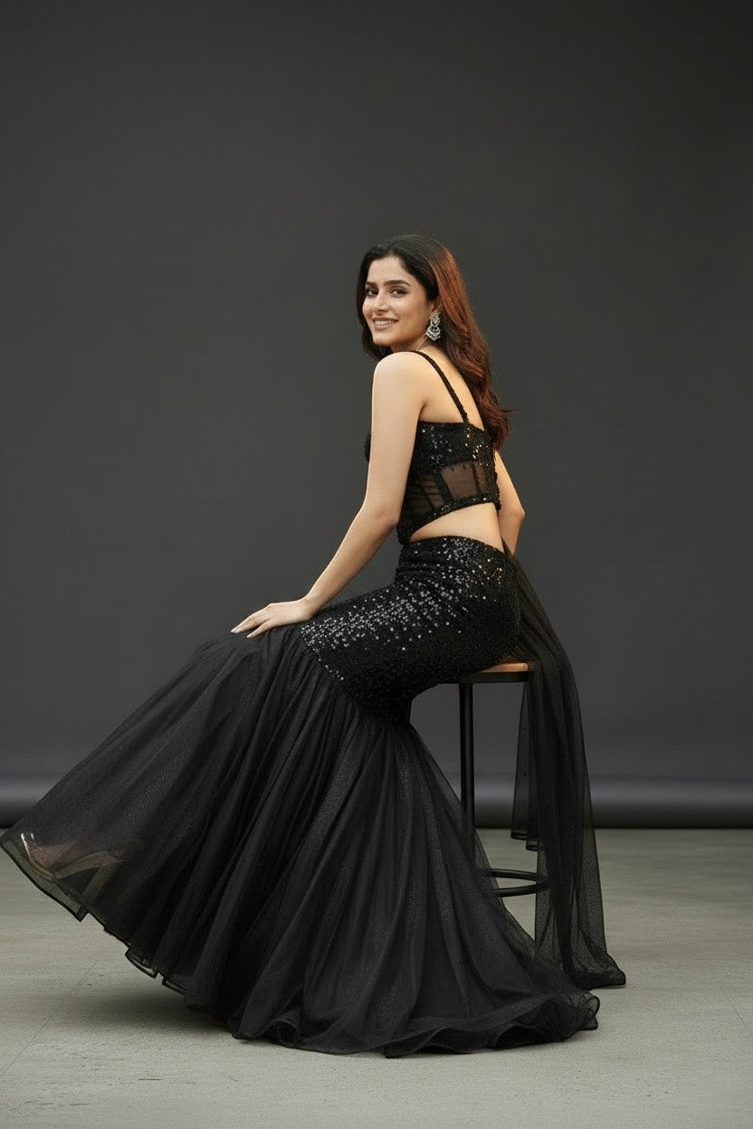 House Of Indian Wedding Attire black shimmer lehenga with corset blouse and flared net skirt.