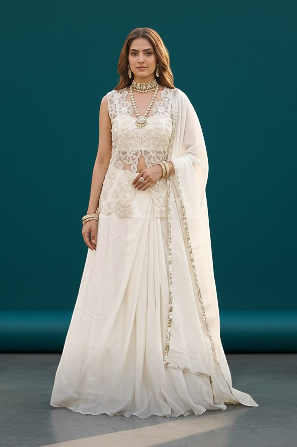 House Of Indian Wedding Attire ivory embroidered sleeveless lehenga set with intricate lacework and shimmering embellishments.