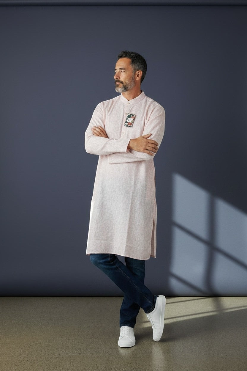 House Of Indian Wedding Attire light pink polyester kurta for men with a subtle textured pattern and a decorative patch on the chest.