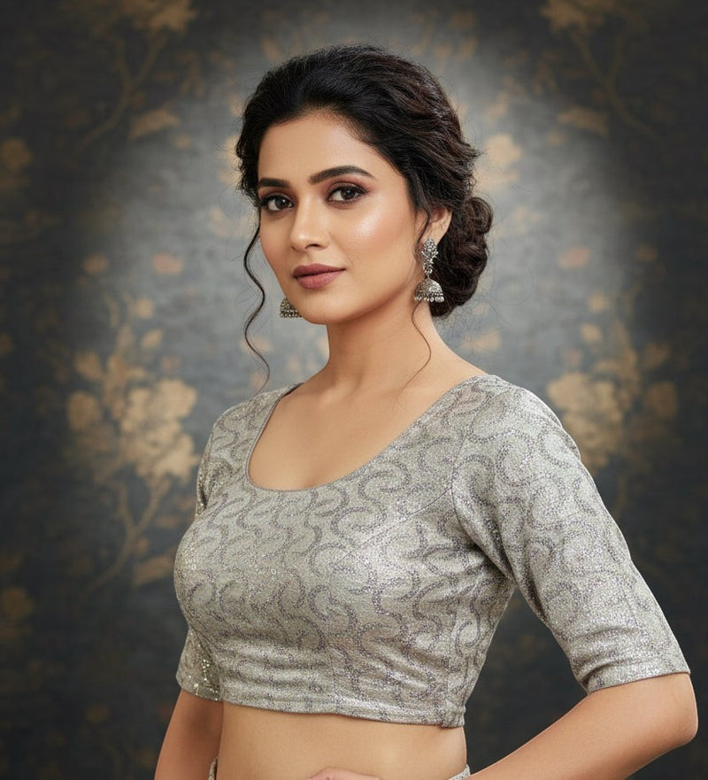 House Of Indian Wedding Attire silver sequined stretch blouse with scoop neck and 3/4 sleeves, fits sizes 32-40.