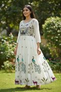 House Of Indian Wedding Attire white chiffon long kurti with embroidered peacock and deer motif. V-neck, 3/4 sleeves.