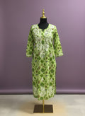 Kurti Connection USA light green cotton kurti with white Chikankari embroidery and floral print. Long sleeves, round neck.