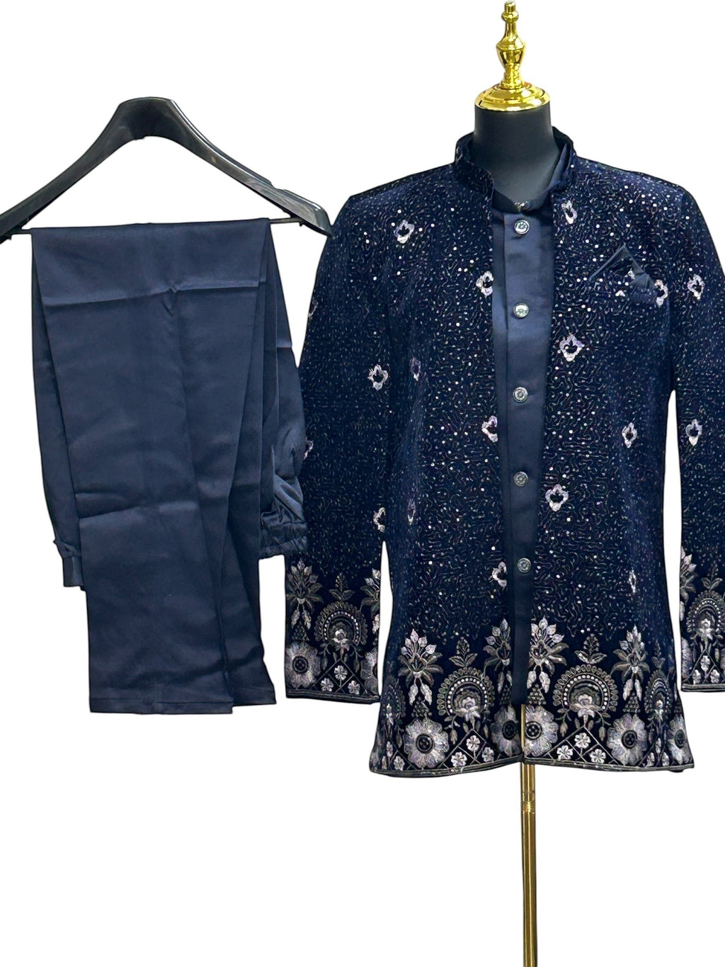 Kurti Connection USA navy blue embroidered Bandhgala suit with intricate silver and white floral embroidery on collar, cuffs, and hem. Includes matching trousers.