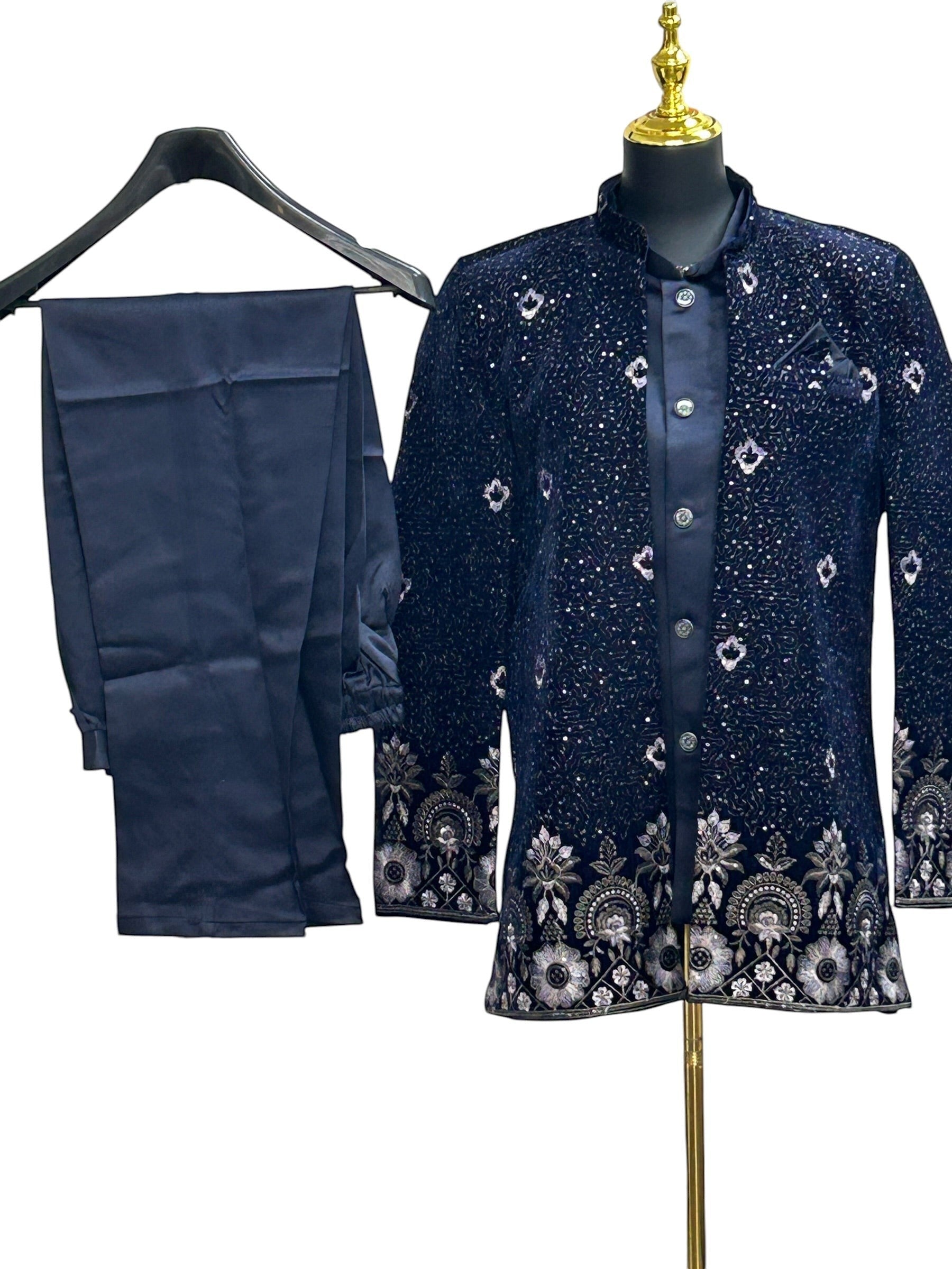 Kurti Connection USA navy blue embroidered Bandhgala suit with intricate silver and white floral embroidery on collar, cuffs, and hem. Includes matching trousers.