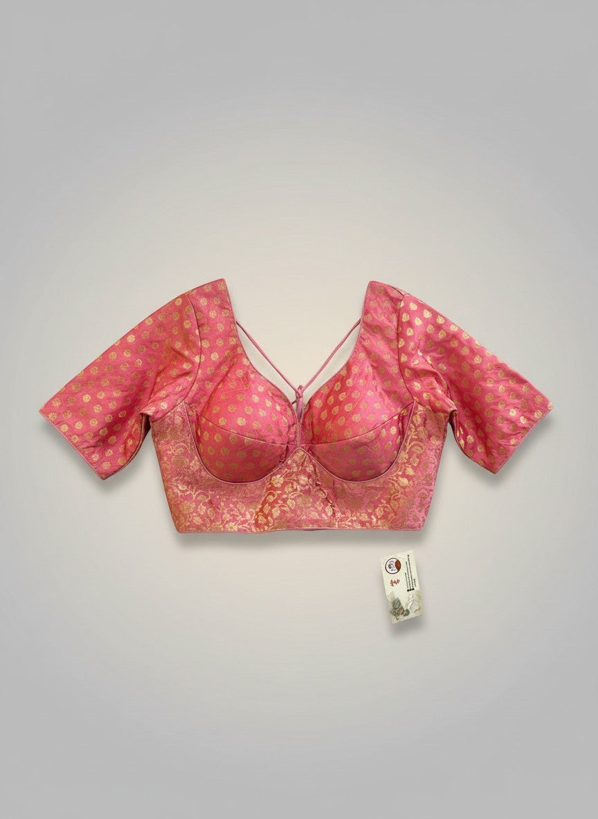 Kurti Connection USA pink brocade blouse with gold floral pattern and criss-cross back straps.