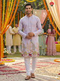 Kurti Connection USA light purple silk kurta set with intricate embroidery of peacocks and deer, paired with white pajama.