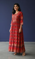 Kurti Connection USA red Anarkali kurti with gold and navy blue prints, detailed yoke, and flowing flare.
