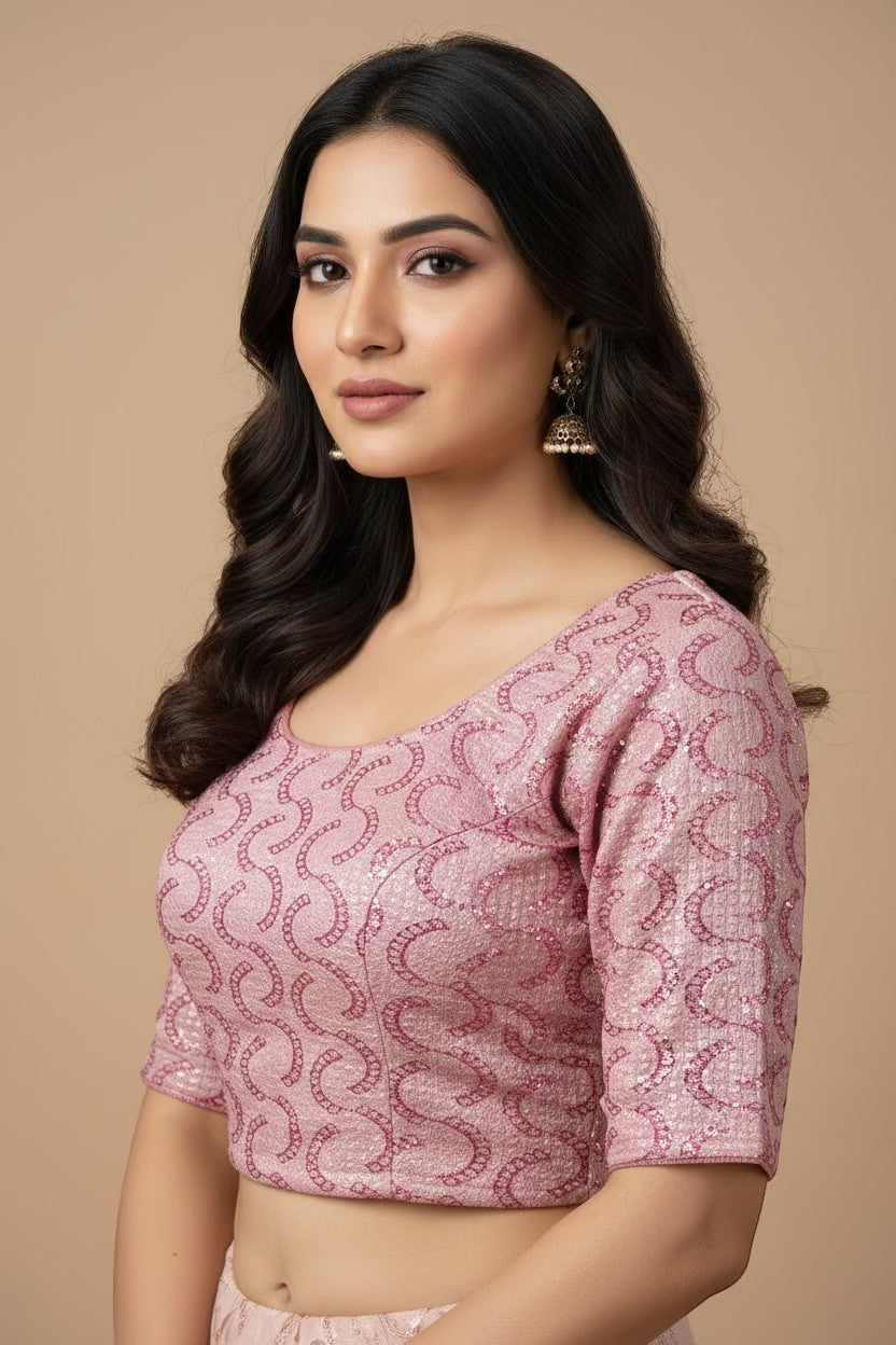 Kurti Connection USA rose pink embroidered crop top blouse with scoop neckline and three-quarter sleeves.