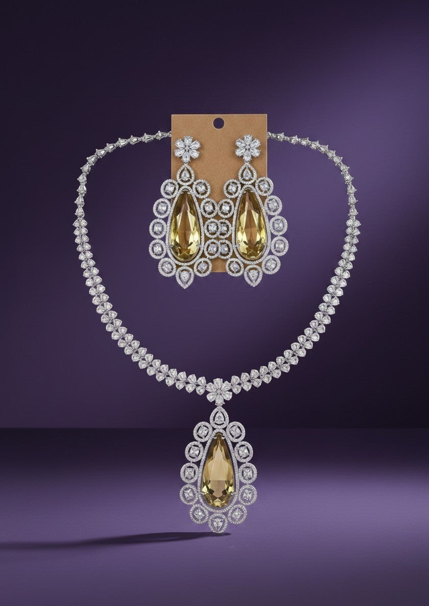 Kurti Connection USA statement necklace and earring set with pear-shaped yellow gemstones and cubic zirconia.