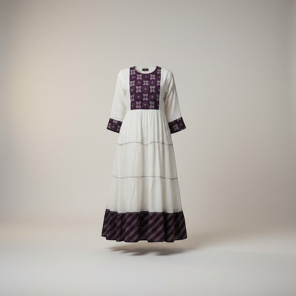 Kurti Connection USA white tiered maxi dress with embroidered purple yoke and cuffs, long sleeves, and a flowing silhouette.